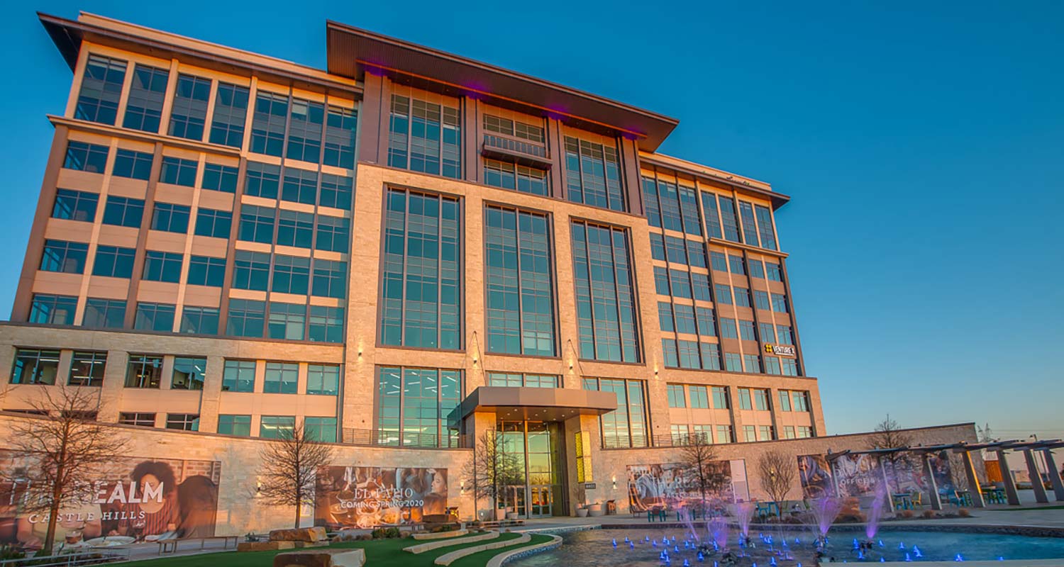 Image of the Offices at night where three new tenants will occupy at The Realm at Castle Hills